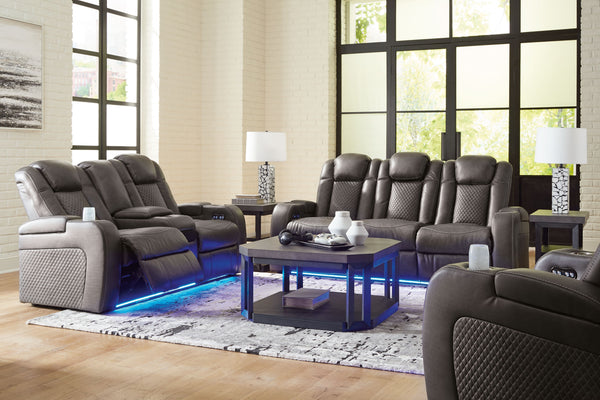 This power reclining living room set goes beyond basic comfort. It upgrades the everyday, turning your living room into an entertainment hub. Donâ€™t want to leave your seat? Keep essentials in reach with assorted charging options, cup holders and storage
