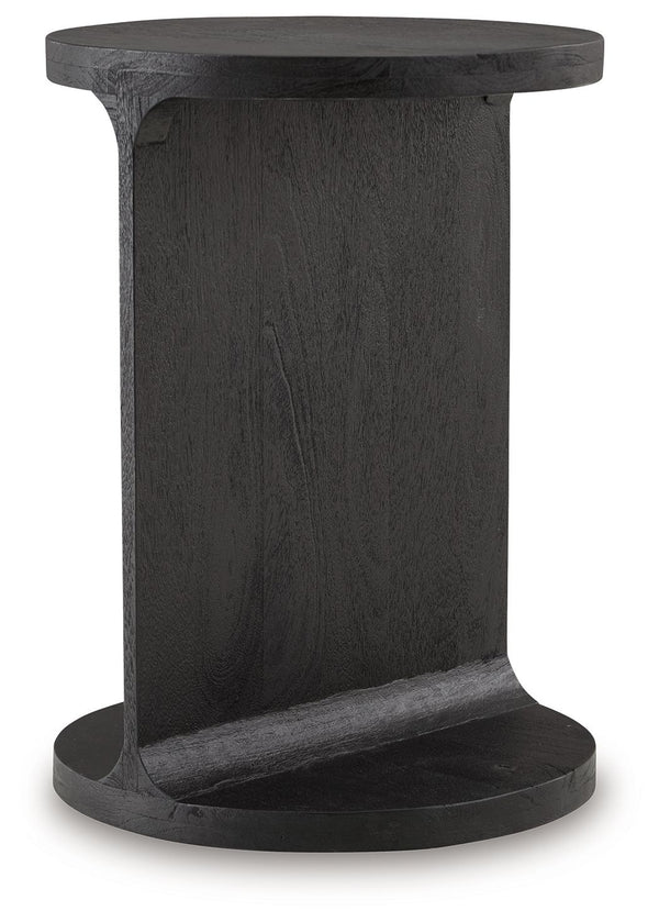 With its striking and adaptable design, this accent table adds instant style to your home. Crafted of solid mango with a sandblasted black finish, its iconic -"I-" silhouette emphasizes your impeccably good taste. The search for simple, chic design ends h