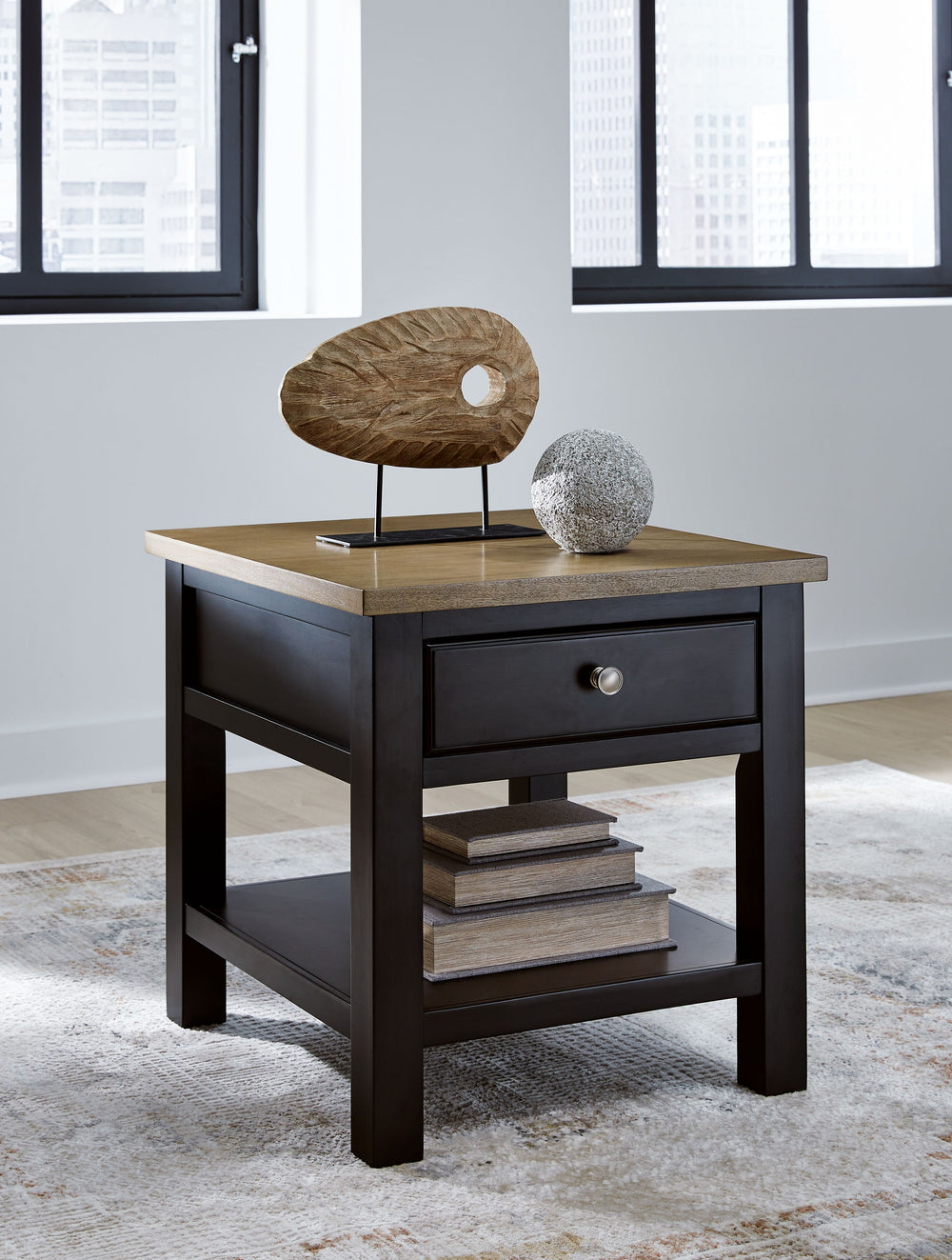 When youâ€™re styling your living room, convenience is key. With this end table, casual flair meets canâ€™t-miss function. Tired of tracking down lost remotes? A handy storage drawer keeps your entertainment essentials close. This fashionably functional p