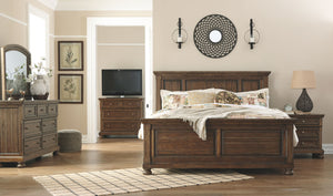 Made with Acacia veneers/engineered board and hardwood solids with a tobacco brown finish. Framed drawers feature fully finished dovetailed drawer boxes, ball bearing side glides and round metal knobs in an aged brass color finish. Dresser features a hidd