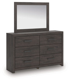 Designed with everyday style in mind, this dresser with mirror is a simply chic approach to modern living. A dark charcoal finish blends black and brown undertones, creating a versatile look that effortlessly pairs with your existing pieces. And for must-