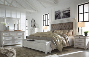 Made with veneers and select hardwood solids in a distressed whitewashed finish. Design features updated traditional styling with generously scaled moulding details. Dresser features 7 full sized drawers with 2 small scaled accessory drawers. Ball bearing