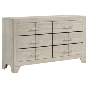This six-drawer dresser combines modern style with a rustic edge, creating the perfect balance of elegance and functionality for your bedroom. With a rustic cream finish over rough-sawn, white-washed engineered paper veneer, it exudes a warm yet contempor