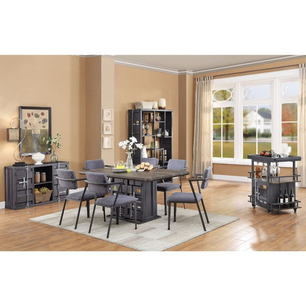 Anchor your dining space in effortless style with the Cargo dining collection. The impressive design elements mix contemporary and industrial themes into one impressive transitional look. The unique rectangular table features a pedestal base with two door