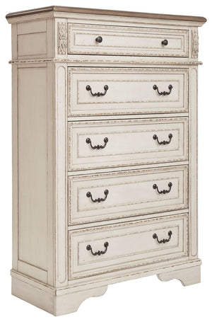 Elevating the art of traditional cottage styling, this chest of drawers is your dream bedroom retreat realized. Its antiqued two-tone aesthetic blends a chipped white with a distressed wood finished top for added charm. Framed drawer fronts and decorative