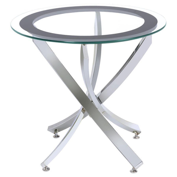 Grace your living space with a stunning end table that blends elegance and functionality in a compact form. The artfully curved metal base provides a delicate yet sturdy foundation, supporting a clear tempered glass top encircled by a chic black frame. Th