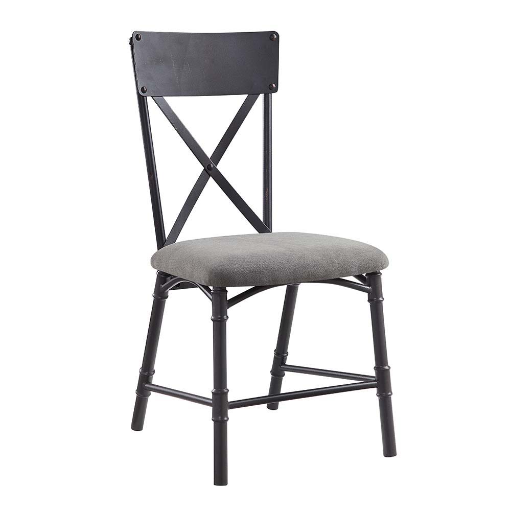 Featuring a rectangular wooden tabletop in an oak finish the Edina dining table merges farmhouse and industrial elements for the ideal dining table for the modern home. Metal corner protectors with rivets that elevate the tabletop. The metal pipe trestle 