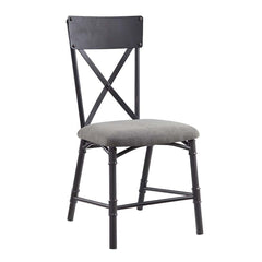 Featuring a rectangular wooden tabletop in an oak finish the Edina dining table merges farmhouse and industrial elements for the ideal dining table for the modern home. Metal corner protectors with rivets that elevate the tabletop. The metal pipe trestle 