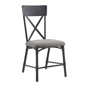 Featuring a rectangular wooden tabletop in an oak finish the Edina dining table merges farmhouse and industrial elements for the ideal dining table for the modern home. Metal corner protectors with rivets that elevate the tabletop. The metal pipe trestle 