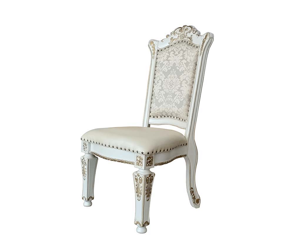 Commanding attention in any space, the impressive design of the Vendom double pedestal dining table will impress everyone. Adorned with classic elements including scrolls, curved shapes, and leaf molding accents to create an old-world charm. The antique p