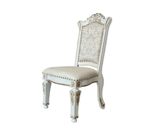 Commanding attention in any space, the impressive design of the Vendom double pedestal dining table will impress everyone. Adorned with classic elements including scrolls, curved shapes, and leaf molding accents to create an old-world charm. The antique p