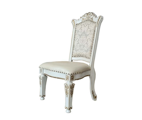 Commanding attention in any space, the impressive design of the Vendom double pedestal dining table will impress everyone. Adorned with classic elements including scrolls, curved shapes, and leaf molding accents to create an old-world charm. The antique p