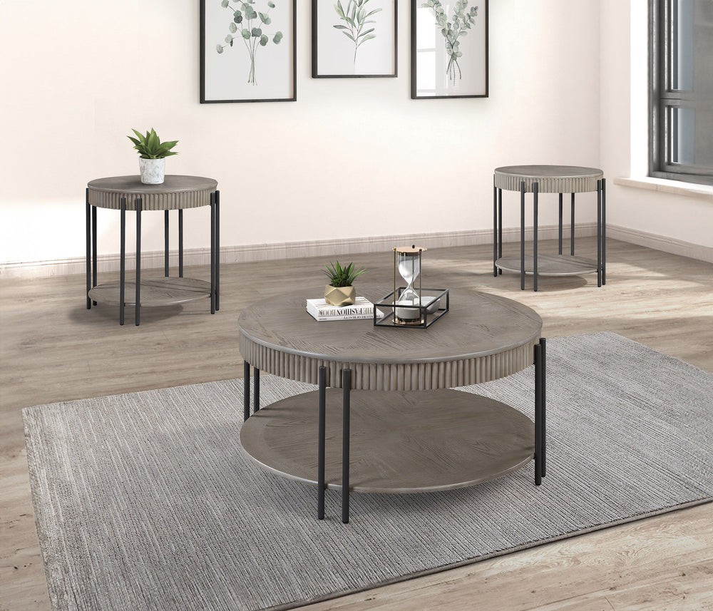 Elevate your living space with this contemporary cocktail table set, designed to blend seamlessly with modern and minimalist interiors. Each piece in the set features a sophisticated round tabletop with a subtle, textured finish that exudes understated el