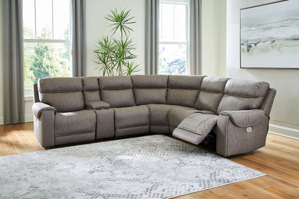 Destination: chic comfort. This power reclining sectional launches your living room into superior form with stellar attention to detail. Exemplifying attainable luxury, its handsome hue has an air of sophistication youâ€™ll long to lounge in. And when you