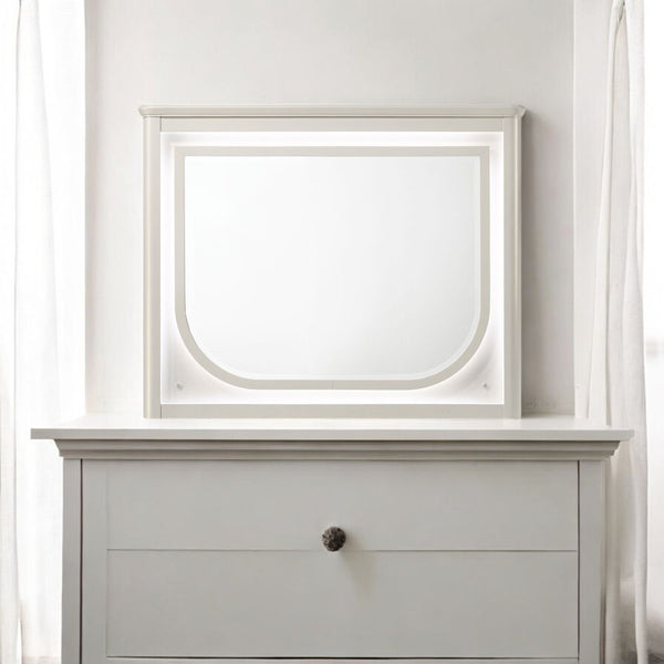  where light gray boucle meets a pearl white finish for an exquisite blend of sophistication and serenity. The clean lines and contemporary design create a harmonious balance