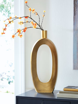  it ushers a confidently curated vibe into your space. The goldtone finish brings an eye-catching metallic flair to your mantel