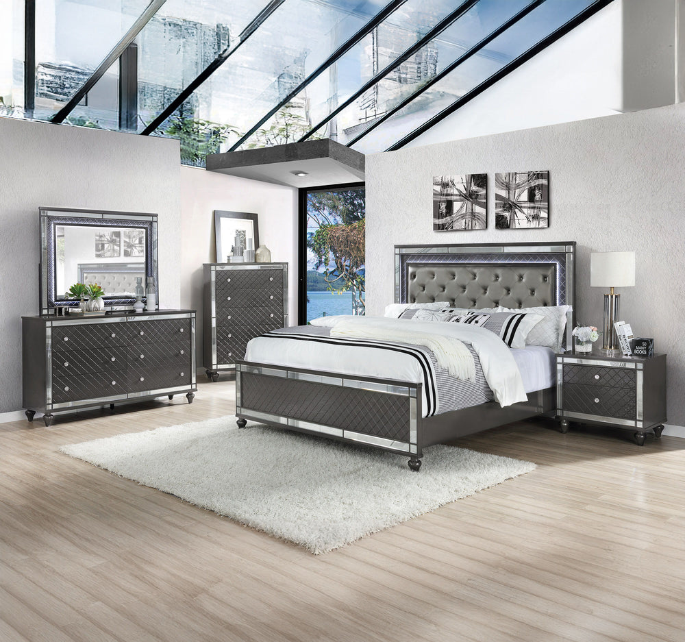 Elevate your sanctuary with this dazzling bedroom collection, where contemporary chic meets timeless charm. The suite boasts a stunning graphite finish, imbuing your space with an air of sophistication and modern luxury. At the heart lies a plush, tufted 