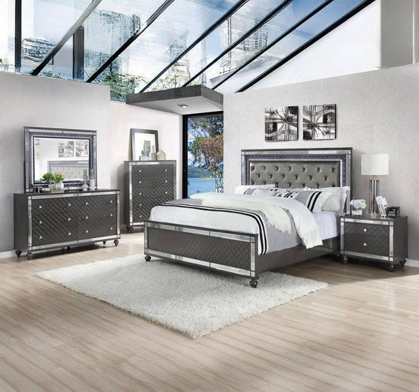 Elevate your sanctuary with this dazzling bedroom collection, where contemporary chic meets timeless charm. The suite boasts a stunning graphite finish, imbuing your space with an air of sophistication and modern luxury. At the heart lies a plush, tufted 
