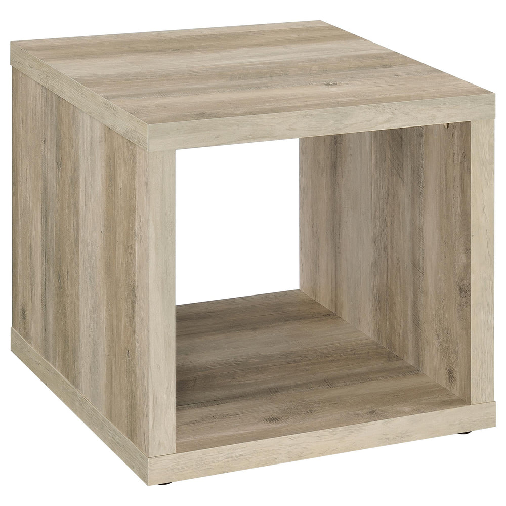 This end table blends a simple cubic silhouette with rustic charm, perfect for farmhouse or modern living rooms. Crafted from durable engineered wood, it features a wood-look finish that enhances its earthy aesthetic. An open design with a lower shelf off