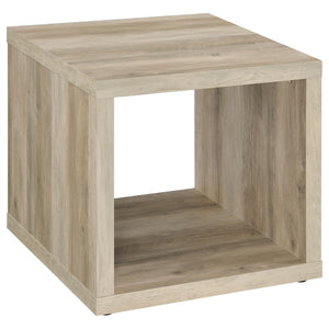 This end table blends a simple cubic silhouette with rustic charm, perfect for farmhouse or modern living rooms. Crafted from durable engineered wood, it features a wood-look finish that enhances its earthy aesthetic. An open design with a lower shelf off