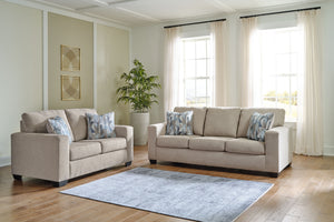 Youâ€™re in for a neat treat with this living room set. Its comfy seats are covered in soft, textural upholstery, and the wide track arms are eager to support your quest for total relaxation. Distressed abstract toss pillows bring a fresh breath of contem