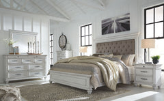 Made with veneers and select hardwood solids in a distressed whitewashed finish. Design features updated traditional styling with generously scaled moulding details. Dresser features 7 full sized drawers with 2 small scaled accessory drawers. Ball bearing