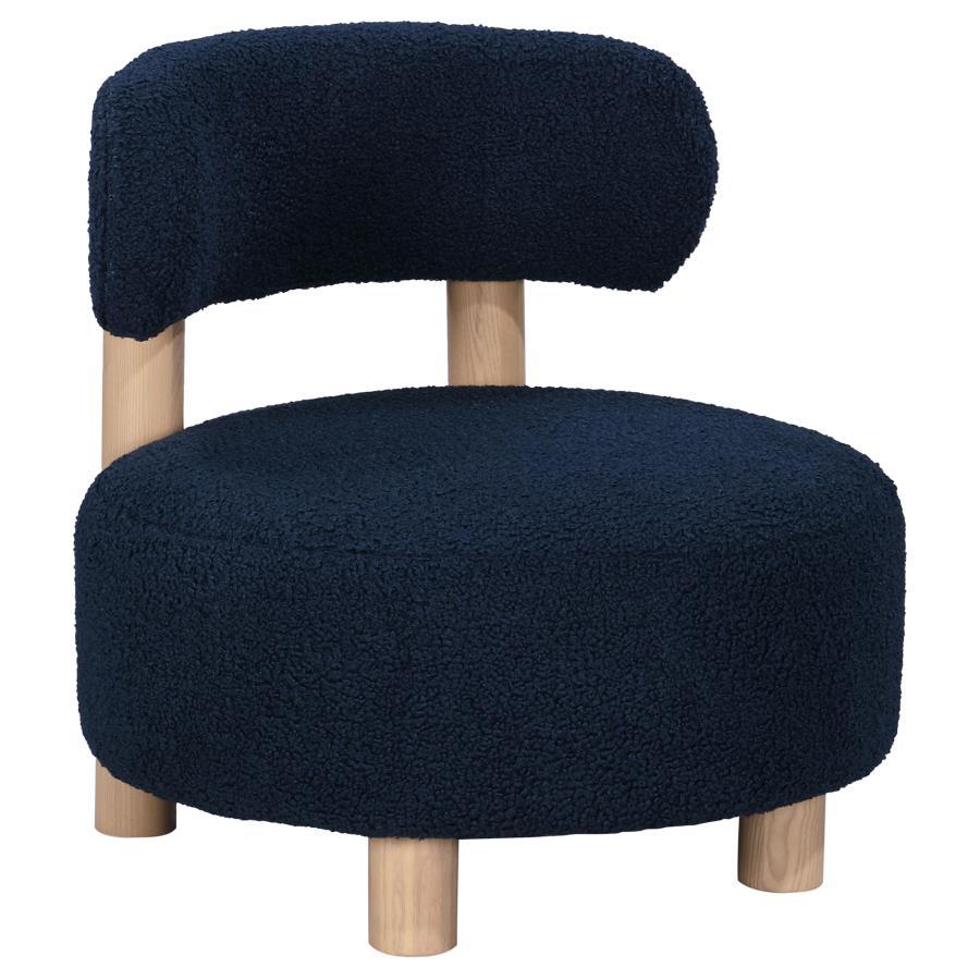 Play with proportionality with the intriguing silhouette of this modern accent armchair. Designed to make a statement in your living area, it boasts thick, plush boucle upholster that sets a trendy ambiance. The chair shows off a low profile, complete wit