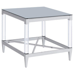 Gracing the side of your favorite armchair, this end table is a masterpiece of reflective beauty and modern design. The mirrored tempered glass top offers a dynamic surface that reflects light and life around it. Clear acrylic leg posts provide a sense of