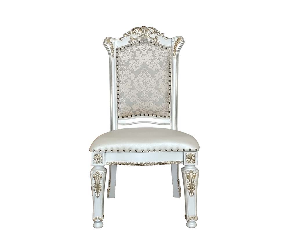 Commanding attention in any space, the impressive design of the Vendom double pedestal dining table will impress everyone. Adorned with classic elements including scrolls, curved shapes, and leaf molding accents to create an old-world charm. The antique p