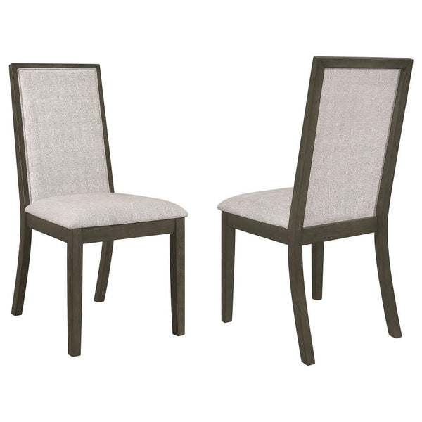 Experience luxurious comfort while dining with our beige upholstered side chairs. The chic dark grey finish perfectly complements the subtlety and elegance of our transitional dining set. These chairs not only offer a stylish seating option but also provi