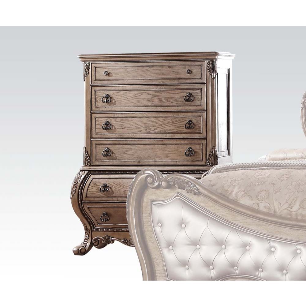 The Ragenardus chest is an impeccable example of truly memorable luxurious traditional design. This three-drawer vintage oak chest features a detailed French style front and English back in a stunning Bombay shape case, Felt-Lined top drawer, side metal g