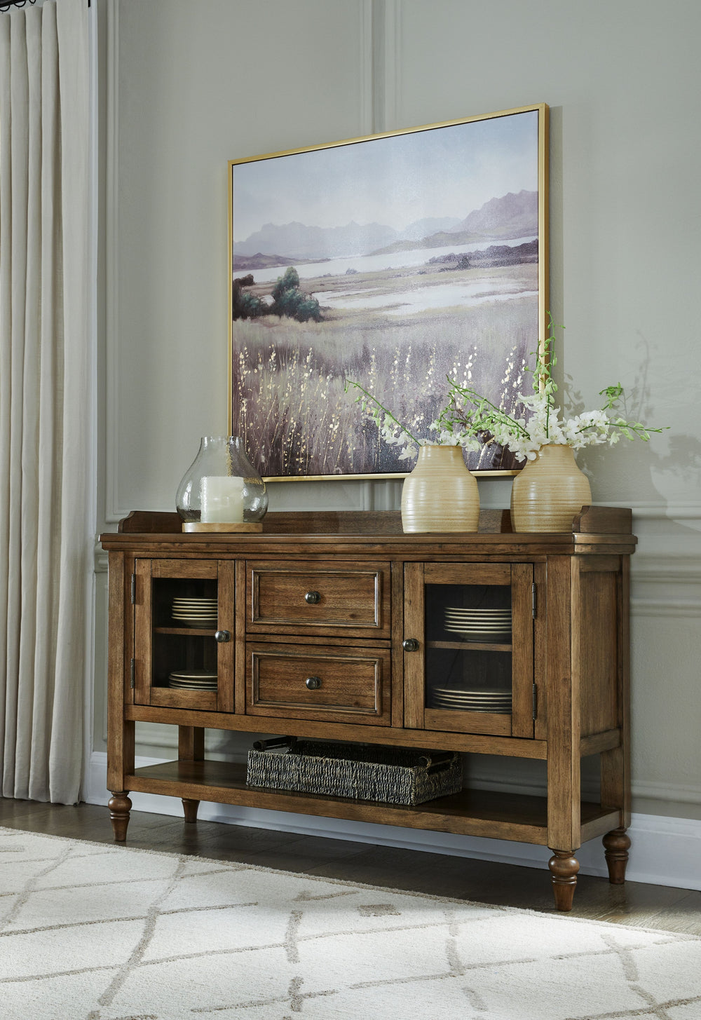 Traditional style doesnâ€™t have to be stuffy. It can feel warm, inviting and beautifully in the moment. Case in point: this dining server. It-'s ready to stand in as an entertainment center, entryway storage or a console table, with a profiled top and gl