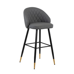 The Oliver Gray faux Leather Bar Stool set combines contemporary style with practical features to enhance any modern space. Each set includes two bar chairs with a sleek, arched back and low profile, offering a chic yet refined aesthetic. Crafted from eco