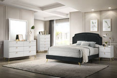 Black and gold are the embodiment of sophistication and chicness. Enjoy a good night-'s sleep with this Zeena contemporary bed. Gold-finished nailhead trim on the headboard lends a refined touch. Perched on beautiful and sturdy gold metal tapered legs tha