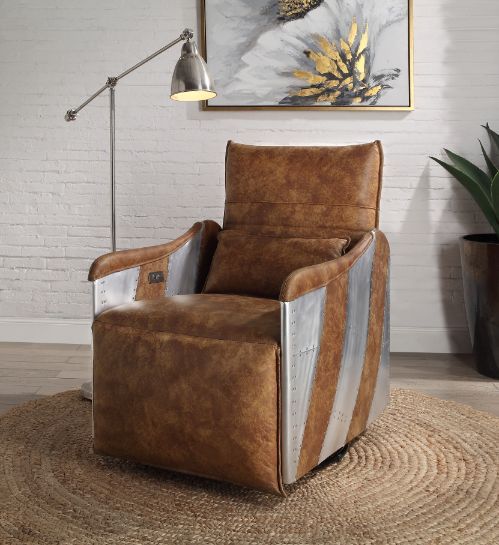 A perfect mixture of industrial style and comfort. The Qalurne Power Motion Recliner is accented by genuine leather and aluminum patchwork for a complete industrial look. It features tight seat and back cushions and offers a full foam seat with genuine le