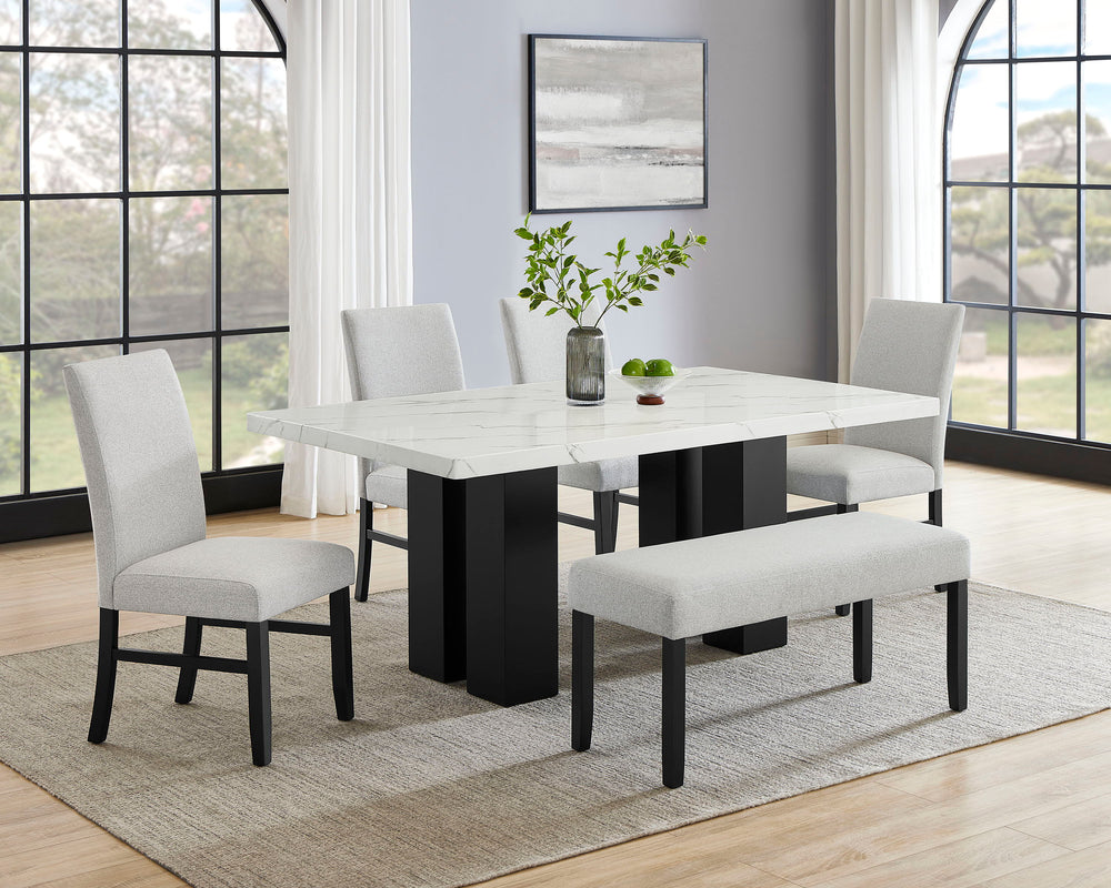 This dining group brings modern sophistication to your dining space with its sleek, contemporary design. The eye-catching marble-like tabletop adds a touch of luxury, perfectly balanced by the sturdy, dark-finished base for a striking contrast. The comfor