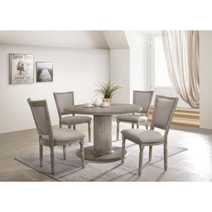 Ideal for a sophisticated dining area, the Gabrian dining collection and its beautifully artistic accents will transform a conventional room into a luxurious dining space. The table features a spectacular double pedestal base with fluted column design typ