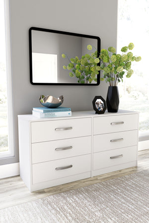  allowing it to blend seamlessly with any decor. Six spacious drawers slide easily on metal ball bearings and can be used to keep your clothes neat and organized. Sleek metal pulls in a brushed nickel