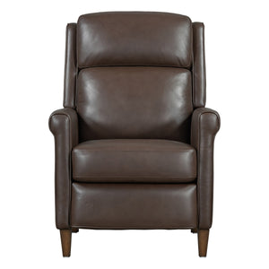  where effortless relaxation meets sophisticated design. This manual pushback recliner is upholstered in soft leather with a custom match