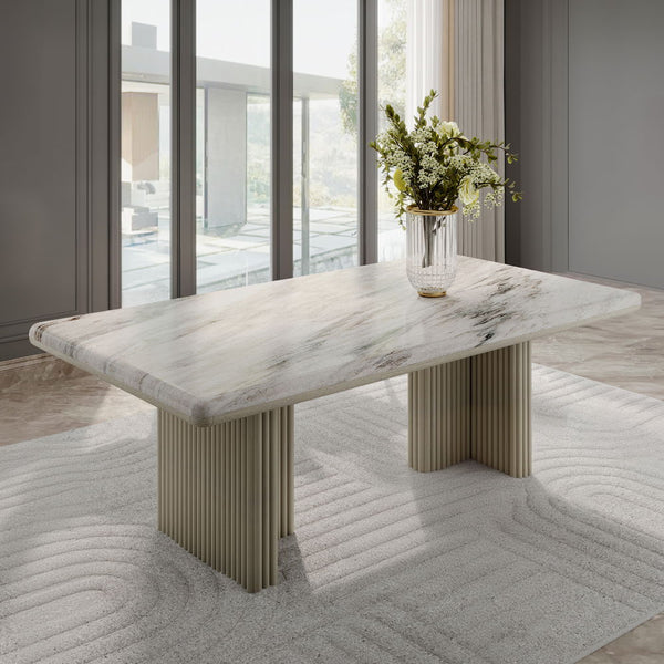 Elevate your dining experience with the Charity dining set. Featuring a sleek marble tabletop and a gray oak finish, this set exudes modern elegance. The sturdy base and stylish chairs create a harmonious blend of comfort and sophistication. Perfect for i