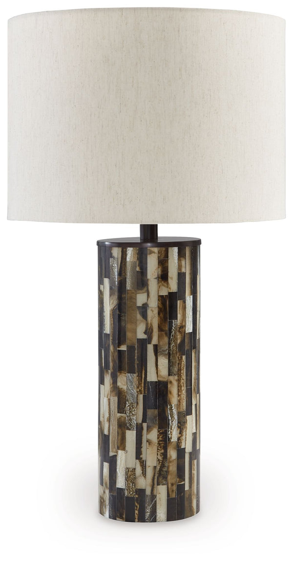 The mosaic patterned Ellford table lamp is a masterful interpretation of neutral hues. It prioritizes unique personality without sacrificing function. A decidedly contemporary addition to your decor, this eye-catching lamp sets the style tone for your hom