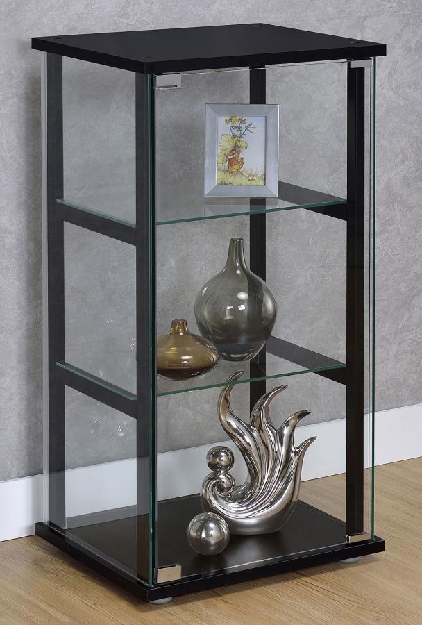 A modern version of a true classic makes a fabulous addition to a transitional space. With linear styling and a fresh look, this curio cabinet offers a perfect venue for showcasing treasured decor. Bold black tops a simple frame, top, and base. Tempered g