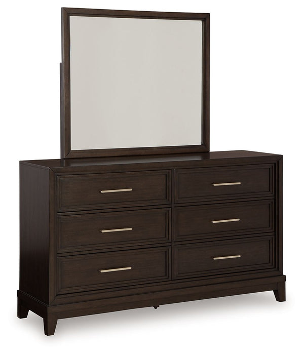 This dresser and mirror set combines modern and art deco styles for both traditional and contemporary arrangements. With elegant stepped moulded framing and ample storage, it adds dimension to your sanctuary while keeping your belongings organized and clu