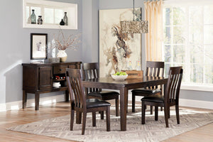 Made with select Oak veneers and hardwood solids with a dry smoky dark brown oak color. Edges and corners have a rounded off, worn effect for a casual look. Server has fully finished drawer boxes with ball bearing side guides. Sturdy looking knobs have de