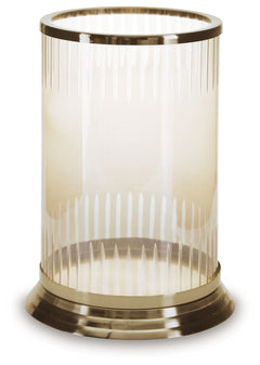Illuminate your home in traditional style. A brass-tone finish on this candle holder brings a classic feel to the metal base. Its carved glass, in a light amber hue, gives you a timeless aesthetic you can love.<br/><br/><b>Product Features</b><ul><li>Made