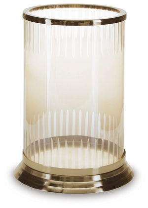 Illuminate your home in traditional style. A brass-tone finish on this candle holder brings a classic feel to the metal base. Its carved glass, in a light amber hue, gives you a timeless aesthetic you can love.<br/><br/><b>Product Features</b><ul><li>Made