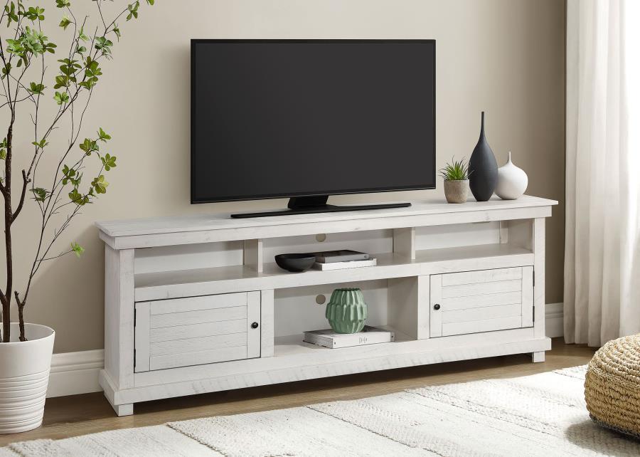 Introduce expansive storage underneath your flat panel television with this modern farmhouse TV stand. It-'s a wooden design with roughhewn details that offer charming texture and casual allure in your living room or den. Two cabinets offer decorative doo
