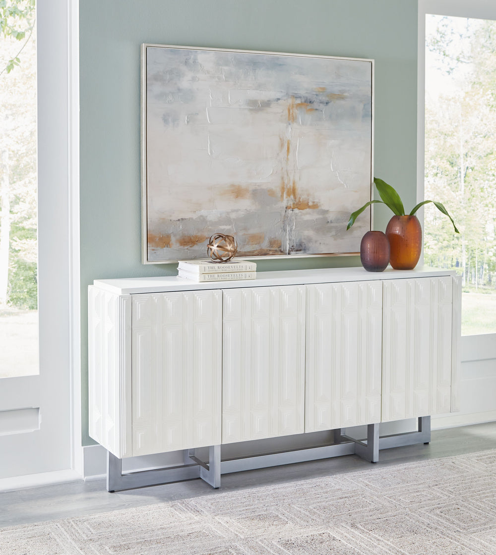 Keep things contemporary cool with the Ornawel accent cabinet. The step pattern on the door fronts lends an appealing geometric touch, with a lightly distressed white finish enriching the design. Touch latch doors open to reveal two shelves for all your s
