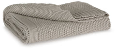 Your place is that much more relaxed and inviting with this cozy throw. Crafted with supreme softness in mind, its neutral hue pairs with a variety of decor. Whether this throw is at the foot of the bed or on the arm of your favorite chair, it-'s wonderfu