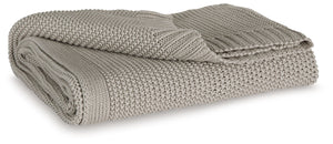 Your place is that much more relaxed and inviting with this cozy throw. Crafted with supreme softness in mind, its neutral hue pairs with a variety of decor. Whether this throw is at the foot of the bed or on the arm of your favorite chair, it-'s wonderfu